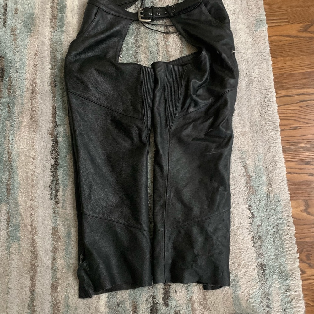 Leather chaps length is 31L and adjustable waist